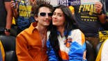 Timothee Chalamet and Kylie Jenner sit courtside during an NBA playoff game.