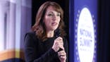 Moms for Liberty co-founder Tina Descovich speaks at national summit.