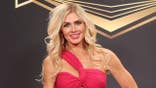 Torrie Wilson stands on the red carpet at the 2025 Hall of Fame at BleauLive Theater in Las Vegas.