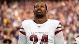 Von Miller #24 of the Washington Commanders looks on during an NFL game at U.S. Bank Stadium.