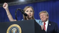 Trump fired back at a protester who interrupted his South Carolina rally, quipping that the heckler's mom is voting for him while showing support for Sen. Darline Graham.