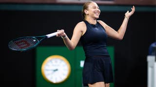 American tennis star Amanda Anisimova leaves fans convinced she drank beer mid-match with mystery beverage