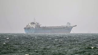 Trade vessel struck by projectile in Strait of Hormuz amid US-Iran talks