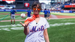 AT&T star Milana Vayntrub shows off her arm during first pitch at Mets game, WNBA flying object & LLWS grass