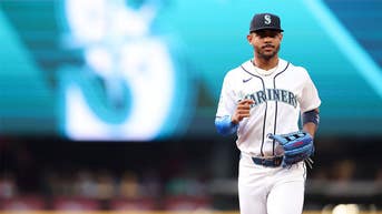 Julio Rodriguez tosses live ball into stands with bases loaded in brutal moment - Fox News