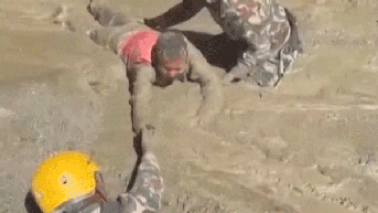 Stunning video shows rescue workers dragging survivors through a mud-packed tunnel - Fox News