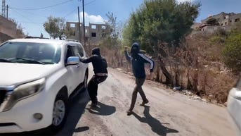 NBC News crew attacked with clubs by masked Israeli settlers in the West Bank - Fox News