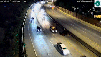 Vehicle narrowly avoids slamming into driver on side of Ohio highway, dramatic video shows - Fox News