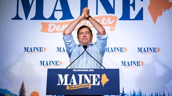 Dem Senate nominee admits 'I take responsibility' after police report alleges he broke down door, punched man