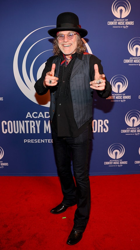 Big Kenny poses on stage at the 2026 ACM Honors.