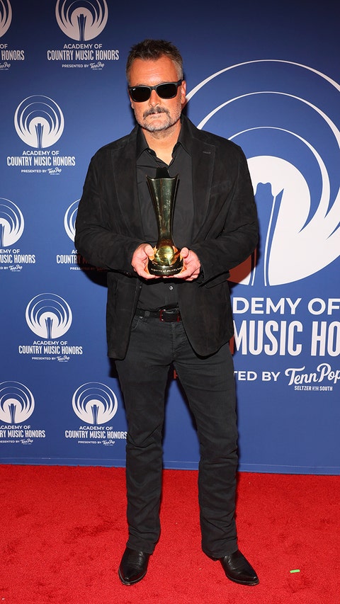 Eric Church poses on the ACM 2026 Honors red carpet.