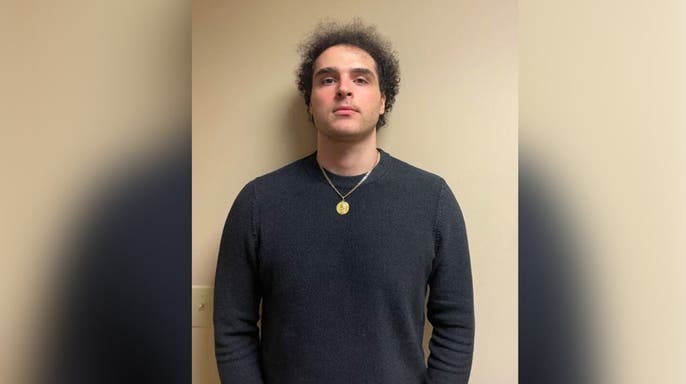 image shows photo of suspect