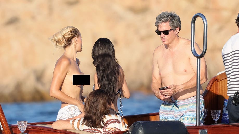 Brooks Nader topless in Italy