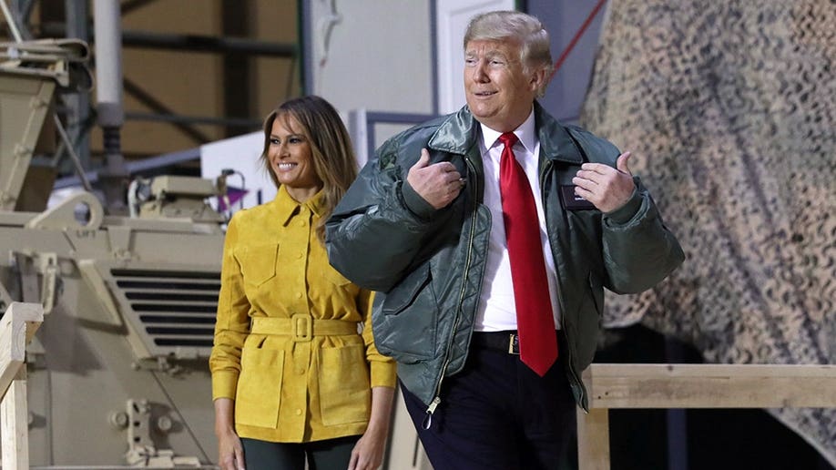 973aa28a-U.S. President Trump delivers remarks to U.S. troops in an unannounced visit to Al Asad Air Base, Iraq