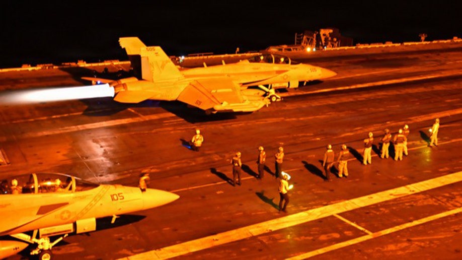 Jet launches from USS George Washington