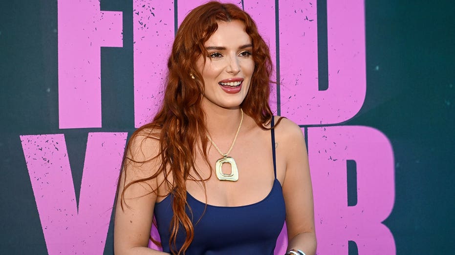 Former Disney star Bella Thorne stuns in green sequin bikini during beach day with fiancé