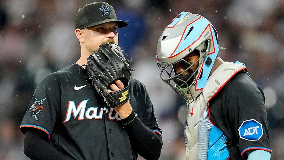 Marlins outfielders collide, knock fly ball over wall to give Braves star a home run in brutal mishap