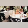 Dolly Parton in a bathtub in 1992.