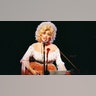 Dolly Parton in 1983 in pink.