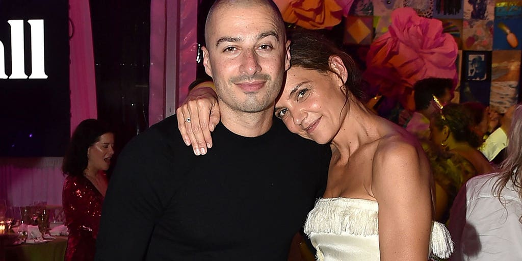 Katie Holmes sizzles in bikini as she kisses boyfriend during Lake Como getaway