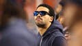 Caleb Williams, limited by a hamstring injury, seen casually pacing Bears sideline during national anthem - Fox News