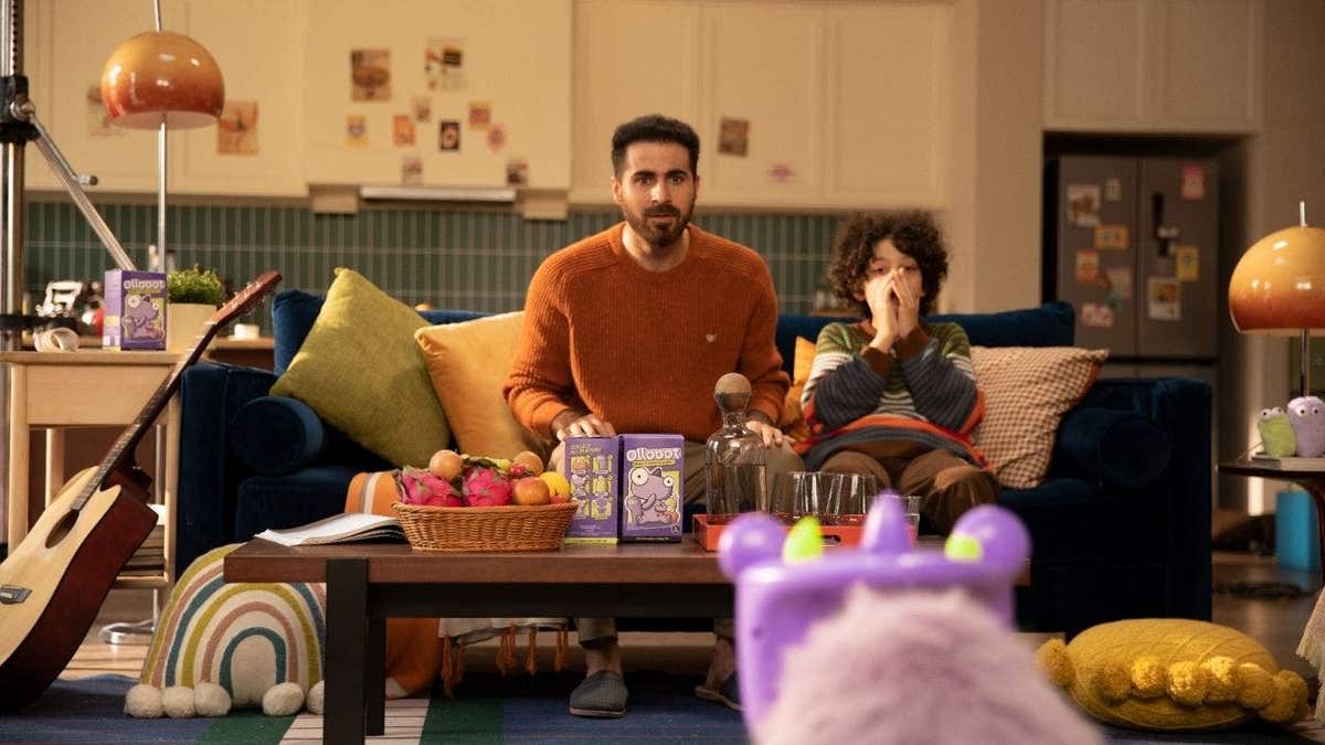 A family reacting to a robot.