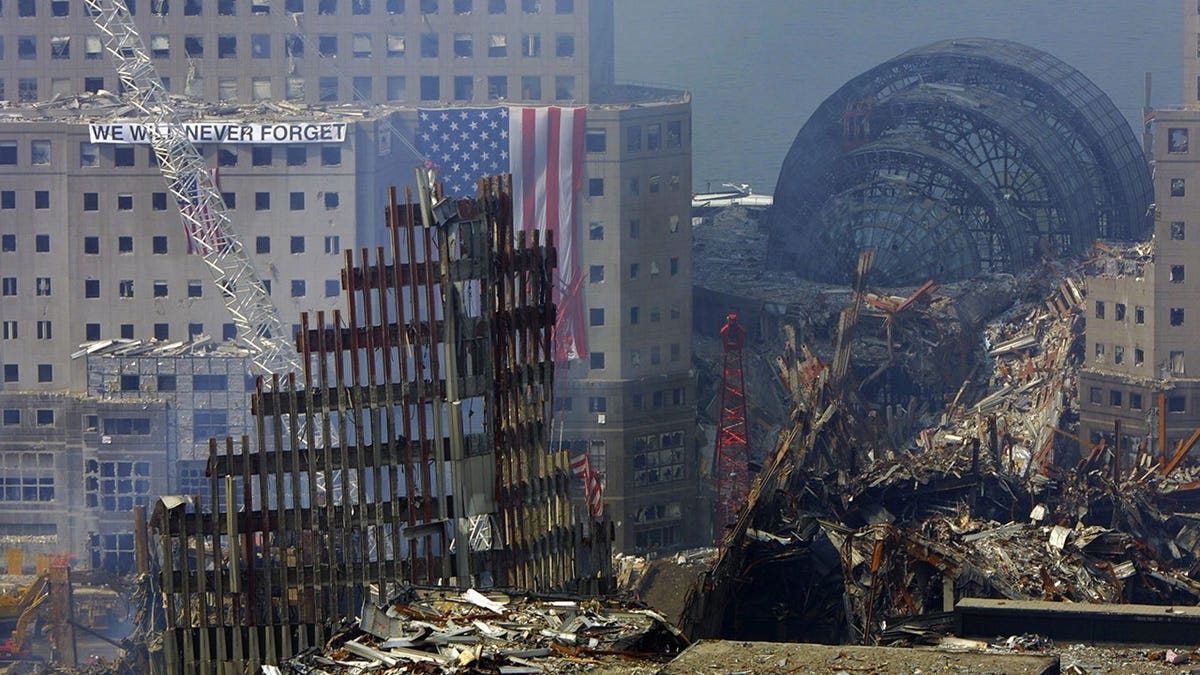 Rubble from the World Trade Center and Winter Garden visible in New York after 9/11 attacks.