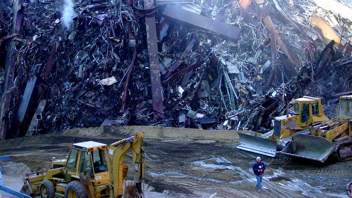 Responders clear rubble from Sept. 11 attacks at Ground Zero.