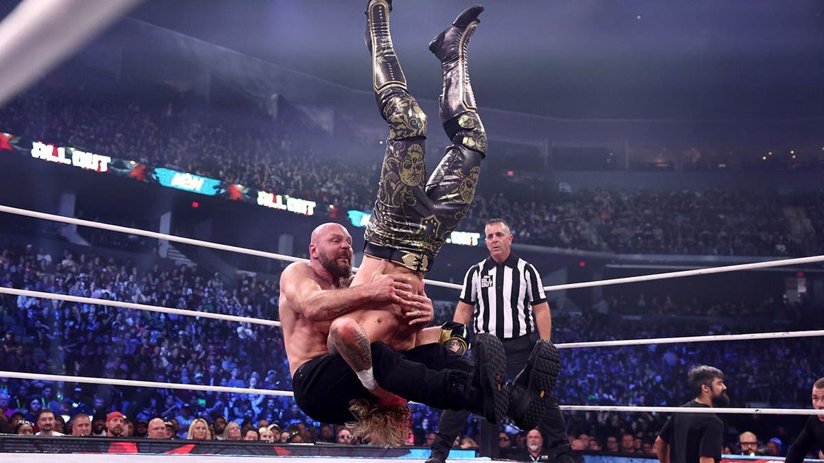 Jon Moxley pile drives Will Ospreay