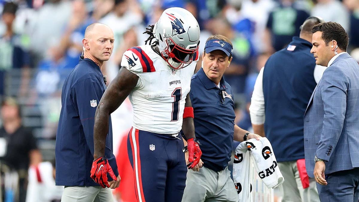 NFL wide receiver A.J. Brown walking off the football field