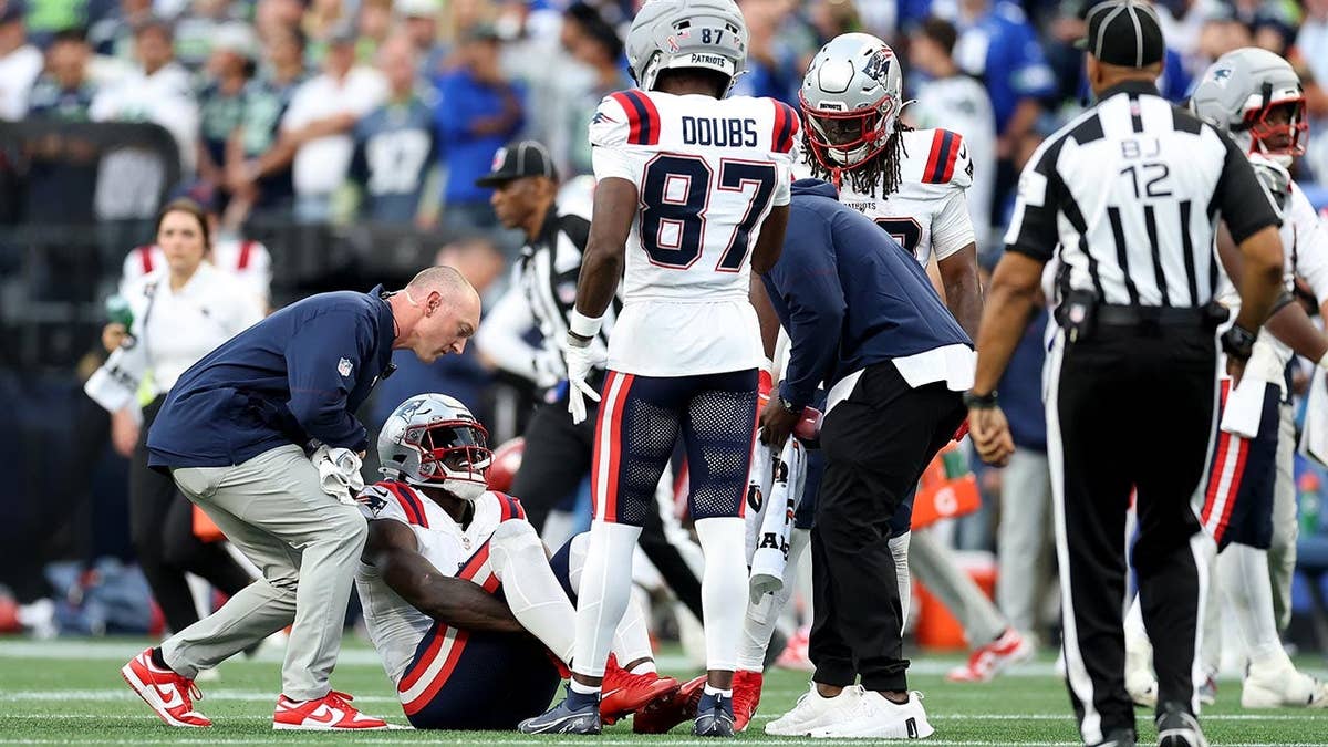 A.J. Brown reacts after an injury during an NFL game