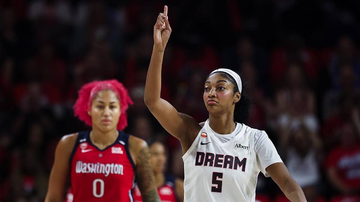 Angel Reese reacts during a WNBA playoff game