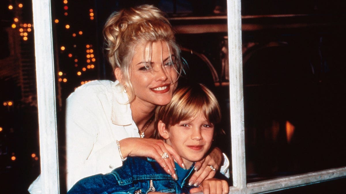 Anna Nicole Smith sits with her son Daniel.