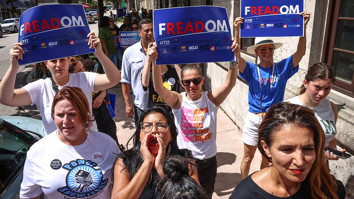 Karla Hernandez-Mats leads demonstrators protesting book restrictions in Florida.