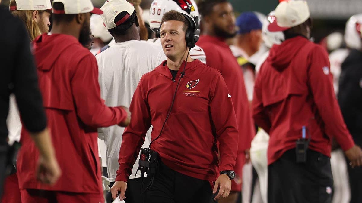 Mike LaFleur looking on during a preseason NFL game