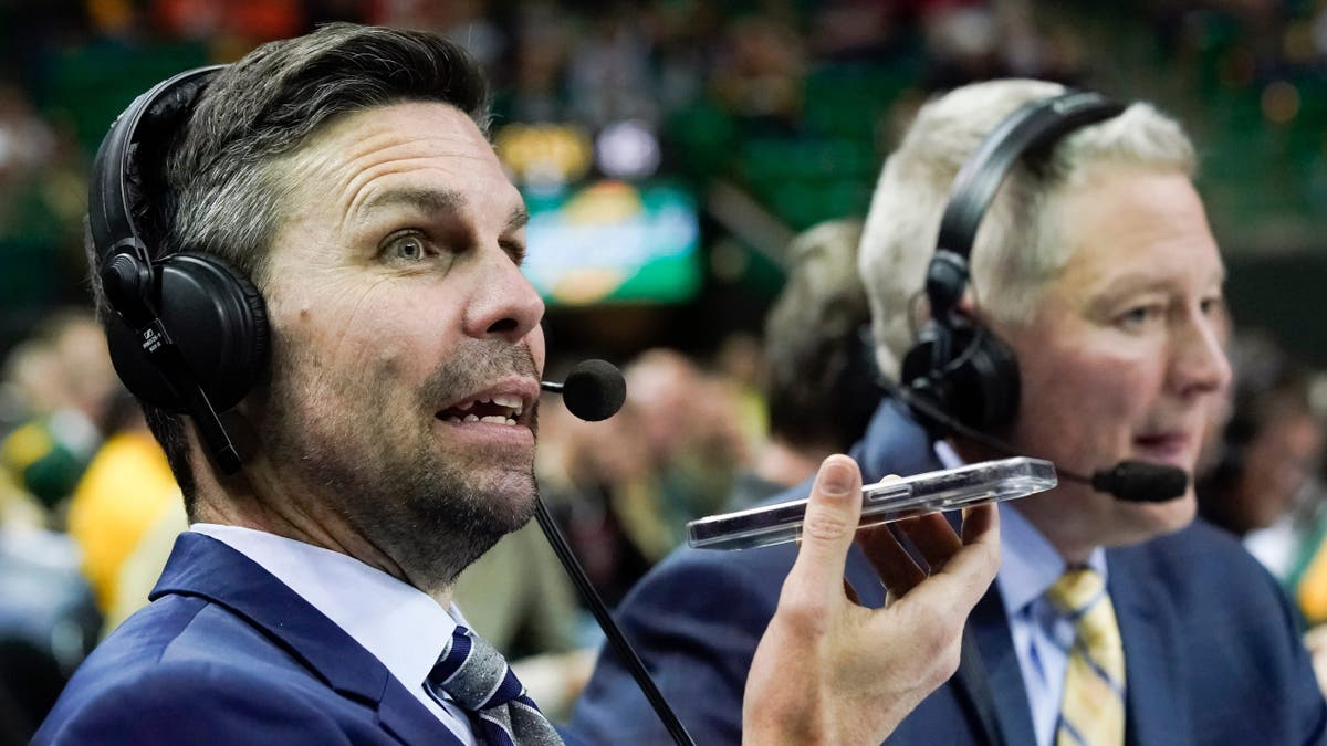 Chris Spatola speaking into a cell phone