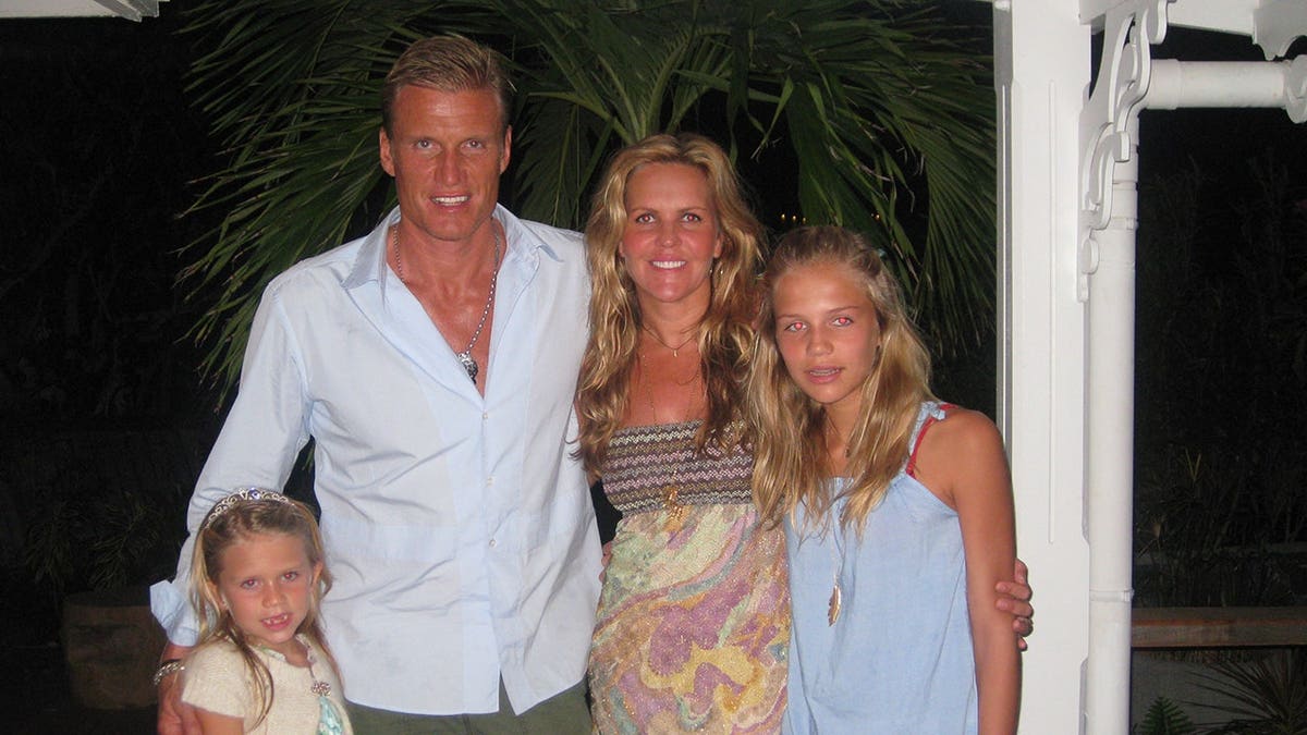 Dolph Lundgren with his first wife and two young daughters.