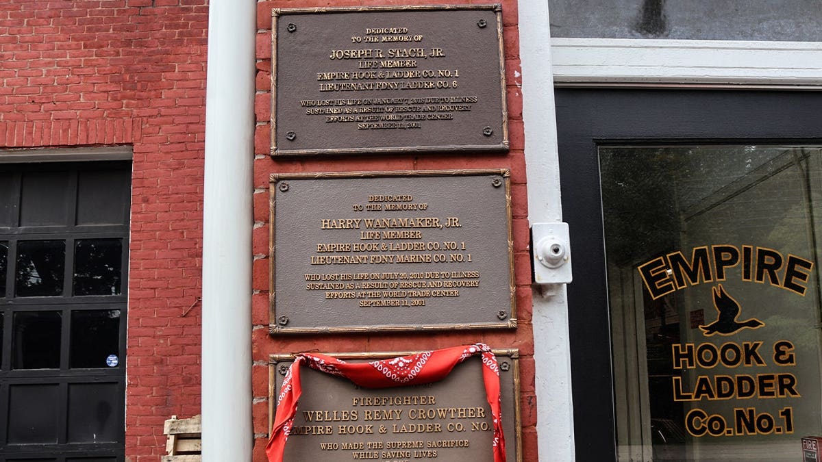 Plaques hanging outside of Empire Hook and Ladder Company No.1 commemorating the firemen they lost in relation to the terrorist attacks of Sept. 11, 2001.