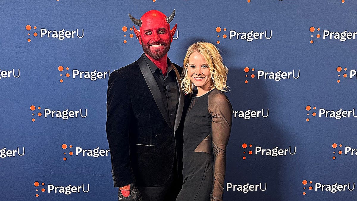 Jarret LeMaster in Devil costume with his wife