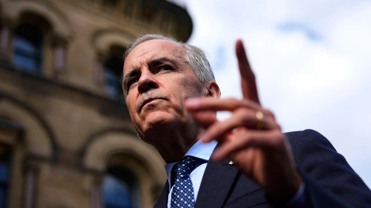 Canadian Prime Minister Mark Carney speaks with members of the media as he arrives at the Office of the Prime Minister and Privy Council in Ottawa, on Tuesday, Sept. 1, 2026.