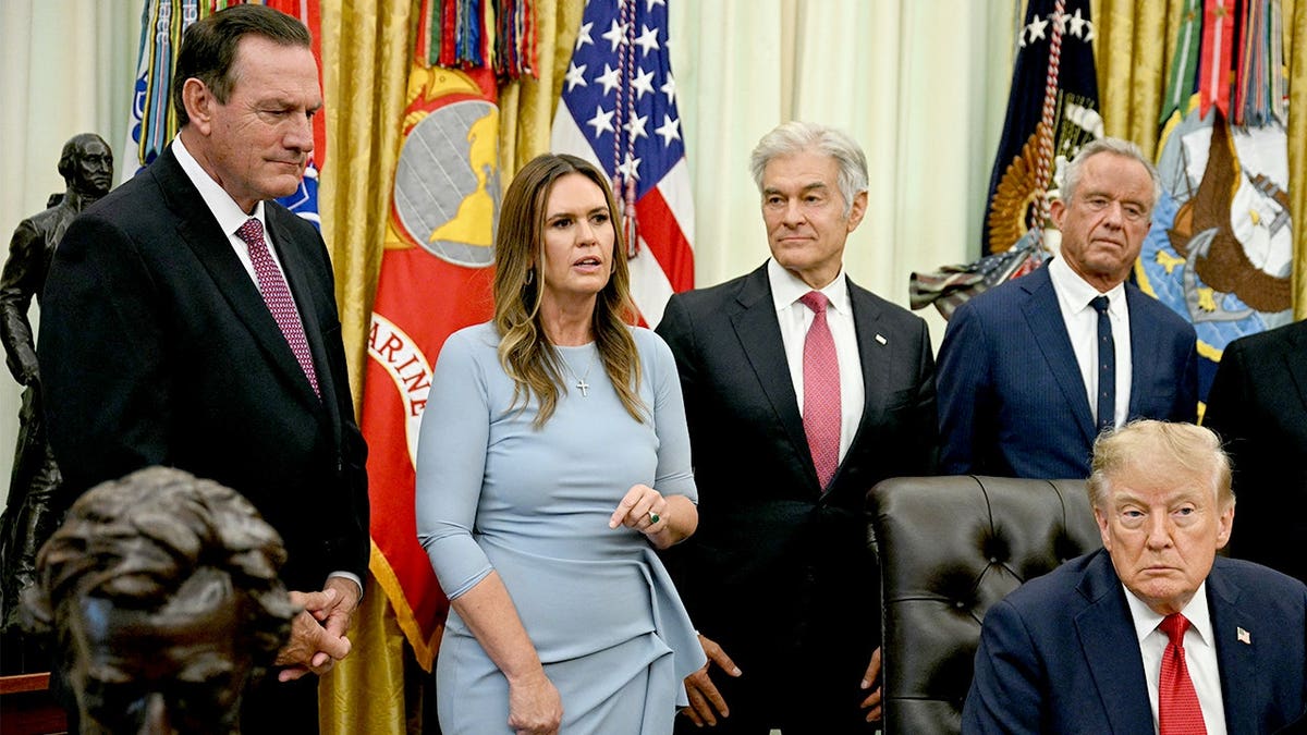 Sarah Huckabee Sanders in Oval Office.