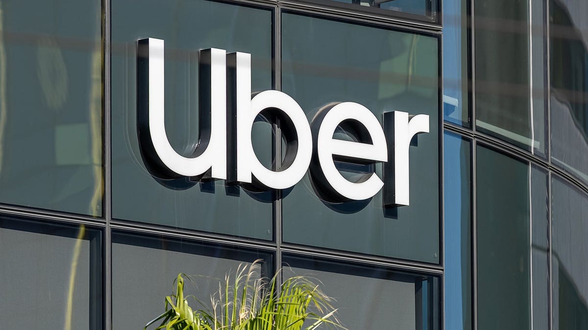 Uber sign on a building.