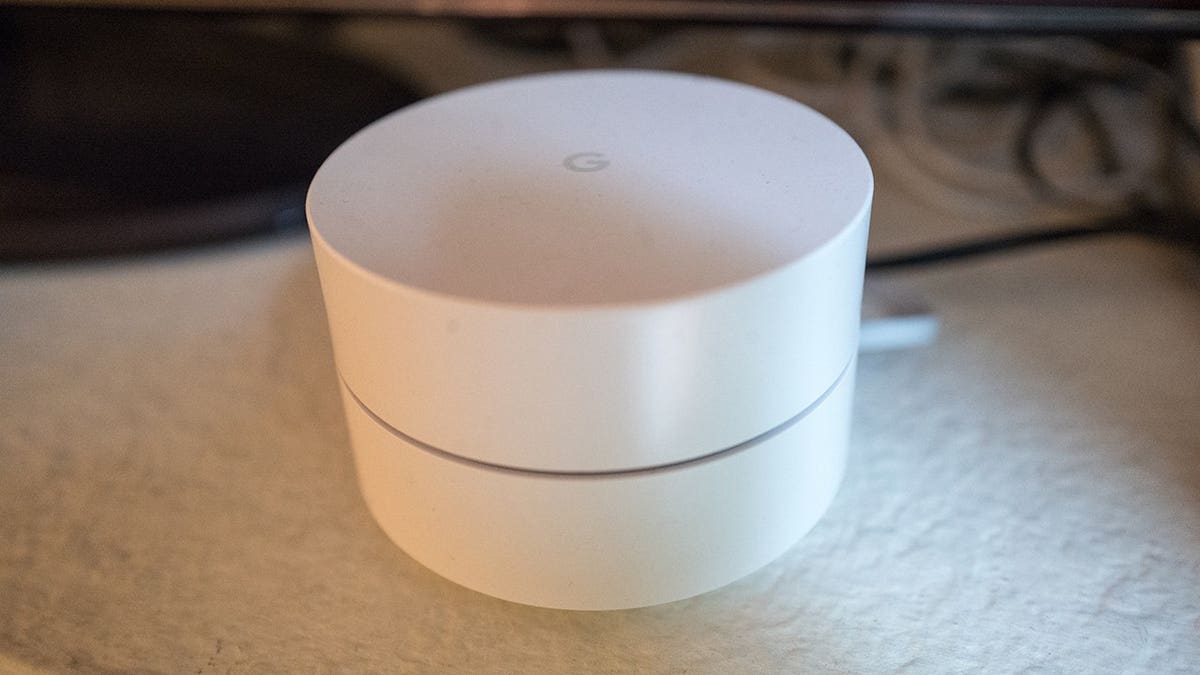 A white Google Wifi router.