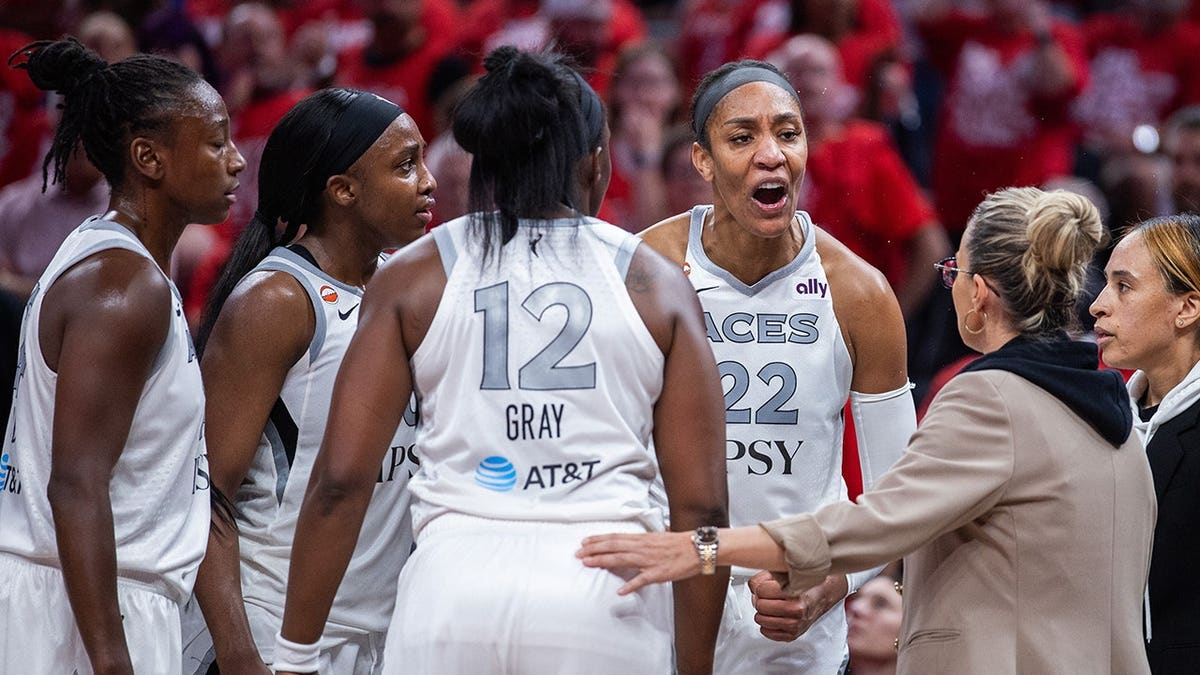 A'ja Wilson talks to Las Vegas Aces teammates during a WNBA playoff game at Gainbridge Fieldhouse.
