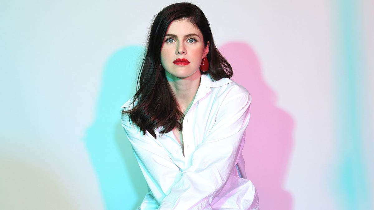 Alexandra Daddario poses for a portrait at San Diego Comic-Con 2024.