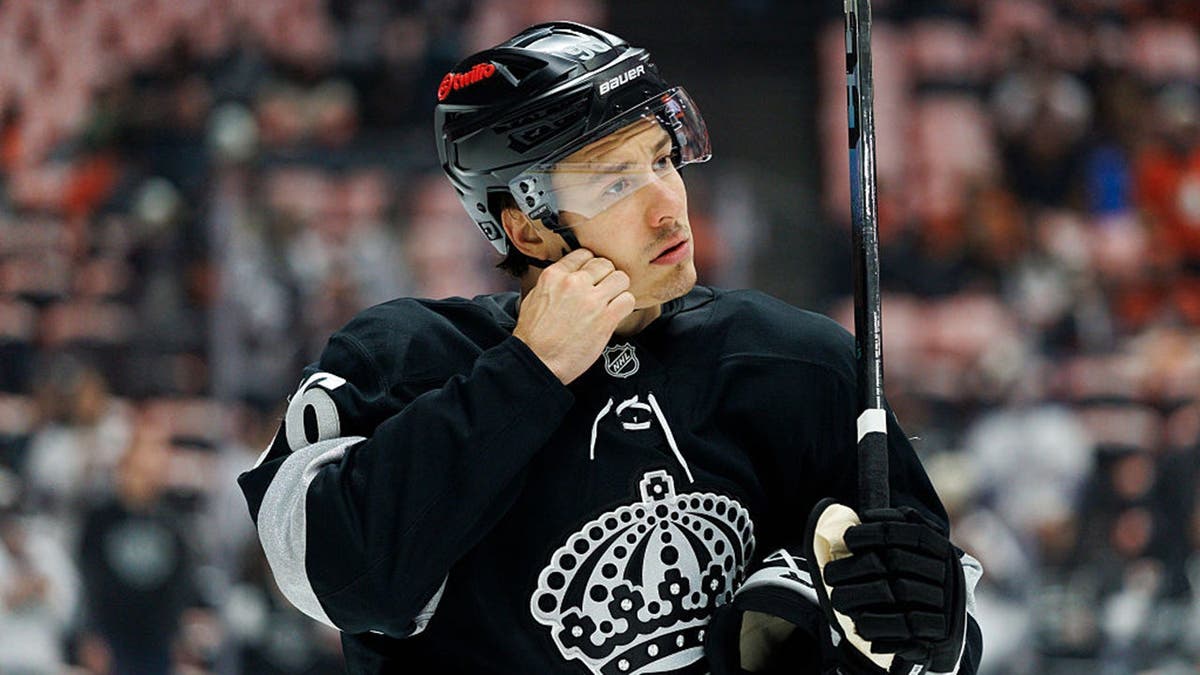 Andrei Kuzmenko adjusts his helmet before a game in Anaheim, California.