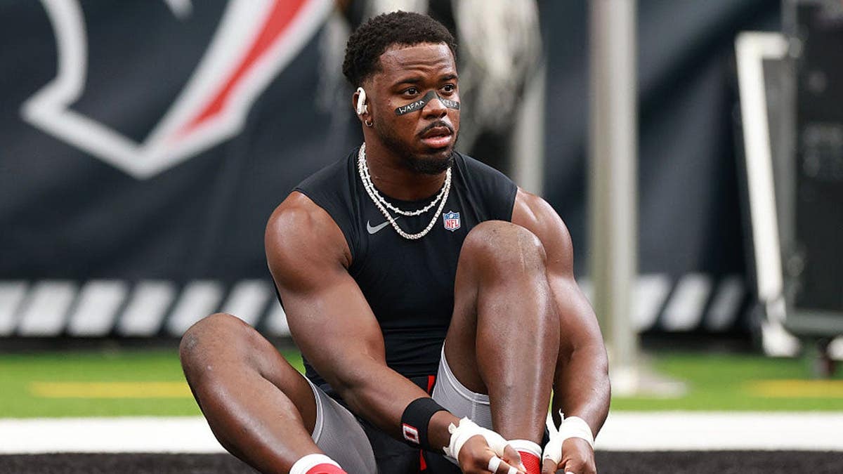 Azeez al-Shaair warms up at NRG Stadium before a game.