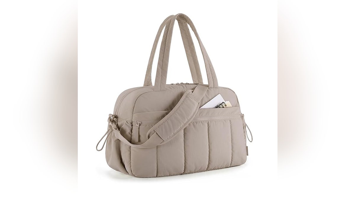 This bag holds clothes, shoes, toiletries and much more.