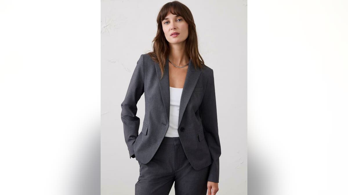 A blazer creates the base of a reporter costume.