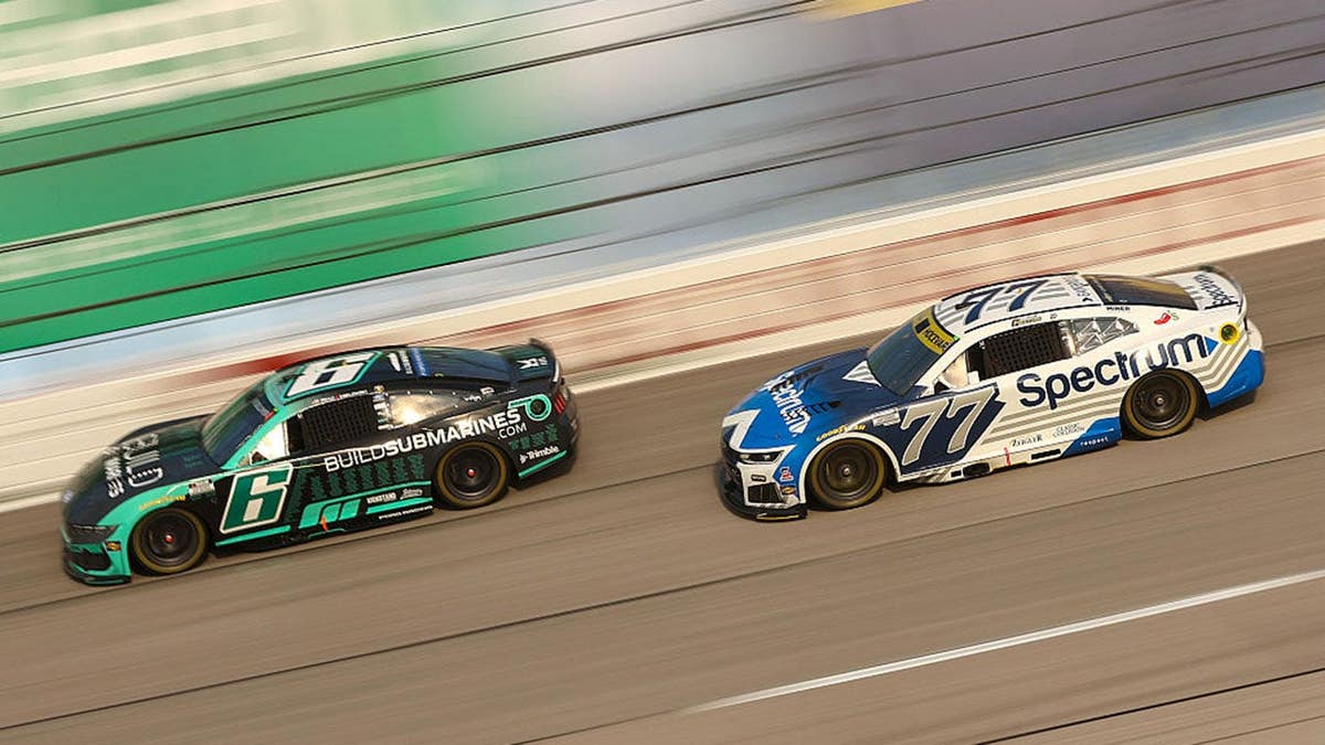 Brad Keselowski in the #6 Ford and Carson Hocevar in the #77 Chevrolet race during the NASCAR Cook Out Southern 500.